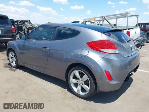 2015 Hyundai Veloster with VIN KMHTC6AD6FU239445, listed as a IAAI auction lot 42757675 with 114,509 mi miles and . Bid and sale history available at DreamBid. Image 3.