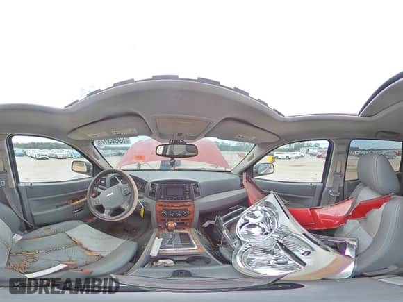 2006 Jeep Grand Cherokee Overland с VIN 1J8HS68256C251926, выставлен на аукционе Copart как лот 59863175 с пробегом 176 525 миль миль и Списание • Salvage title. История ставок и продаж доступна на DreamBid. Изображение 16.