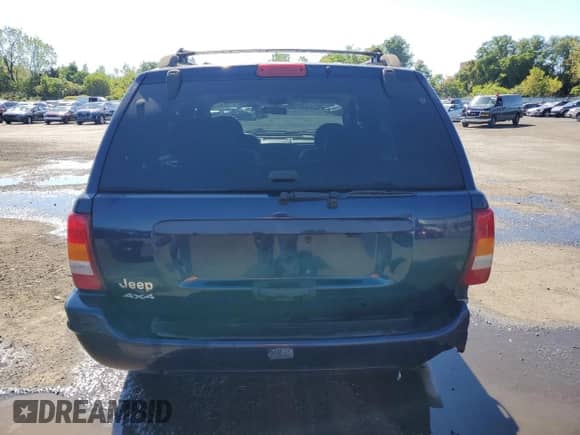 2004 Jeep Grand Cherokee Laredo z VIN 1J4GW48S54C268387, wystawiony jako Copart lot #81308595 z przebiegiem 109 173 mil mil oraz Szkoda całkowita • Salvage title. Historia ofert i sprzedaży dostępna na DreamBid. Obrazek 6.