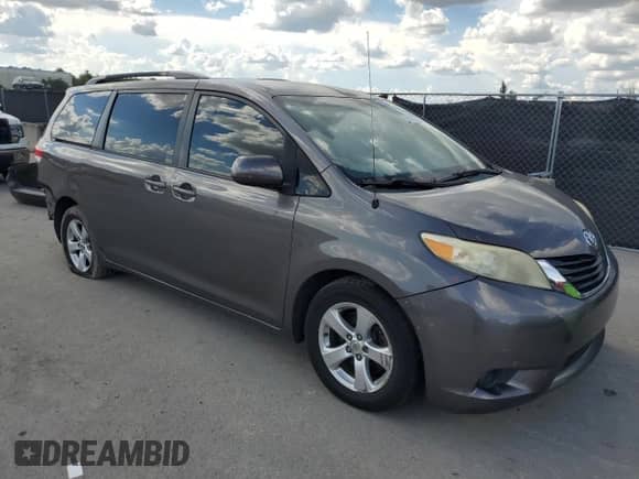 2013 Toyota Sienna LE AAS with VIN 5TDKK3DC5DS328218, listed as a Copart auction lot 69023575 with 185,287 mi miles and Salvage title. Bid and sale history available at DreamBid. Image 4.