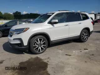 2021 Honda Pilot Touring 8-Passenger z VIN 5FNYF5H96MB011738, wystawiony jako Copart lot #68089255 z przebiegiem 126 655 mil mil oraz Szkoda całkowita • Salvage title. Historia ofert i sprzedaży dostępna na DreamBid. Obrazek 1.