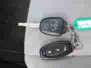 2014 Toyota Prius One z VIN JTDKDTB37E1569922, wystawiony jako IAAI lot #42956402 z przebiegiem 90 051 mil mil oraz . Historia ofert i sprzedaży dostępna na DreamBid. Obrazek 11.