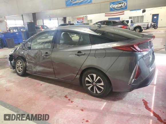2018 Toyota Prius Plus with VIN JTDKARFP0J3094010, listed as a Copart auction lot 82364905 with 134,611 mi miles and Salvage title. Bid and sale history available at DreamBid. Image 2.