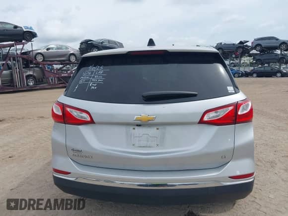 2018 Chevrolet Equinox LT with VIN 2GNAXJEV1J6211511, listed as a IAAI auction lot 43246513 with 98,802 mi miles and . Bid and sale history available at DreamBid. Image 16.