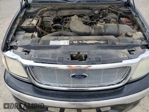 2000 Ford F-150 XL z VIN 2FTRX07L1YCB10191, wystawiony jako Copart lot #86184045 z przebiegiem Nie podano mil oraz Szkoda całkowita • Salvage title. Historia ofert i sprzedaży dostępna na DreamBid. Obrazek 11.