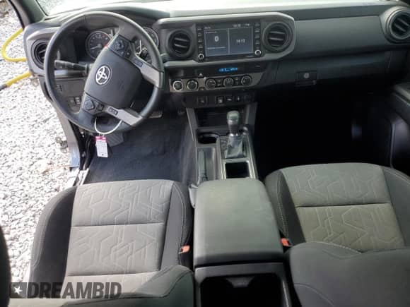 2022 Toyota Tacoma TRD Off Road with VIN 3TMCZ5AN4NM515100, listed as a Copart auction lot 84576995 with 33,917 mi miles and Salvage title. Bid and sale history available at DreamBid. Image 8.