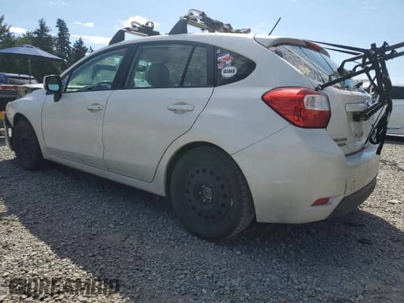 2013 Subaru Impreza Premium with VIN JF1GPAD63DG836595, listed as a Copart auction lot 68912905 with 194,511 mi miles and Salvage title. Bid and sale history available at DreamBid. Image 2.
