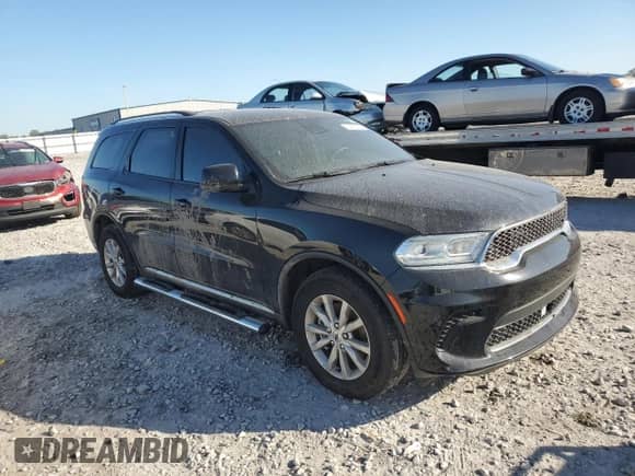 2023 Dodge Durango SXT with VIN 1C4RDHAGXPC573633, listed as a Copart auction lot 70453015 with 40,966 mi miles and Salvage title. Bid and sale history available at DreamBid. Image 4.