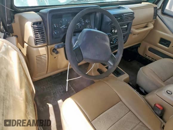 2000 Jeep Wrangler SE with VIN 1J4FA29P2YP800721, listed as a Copart auction lot 67490145 with 128,182 mi miles and Clean title. Bid and sale history available at DreamBid. Image 8.