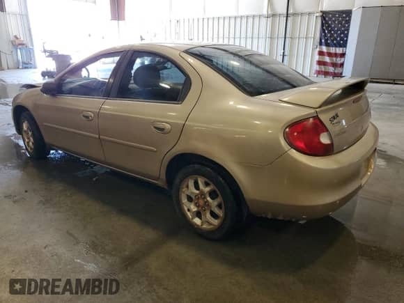 2002 Dodge Neon ES with VIN 1B3ES56C82D594834, listed as a Copart auction lot 63857745 with 100,094 mi miles and Salvage title. Bid and sale history available at DreamBid. Image 2.