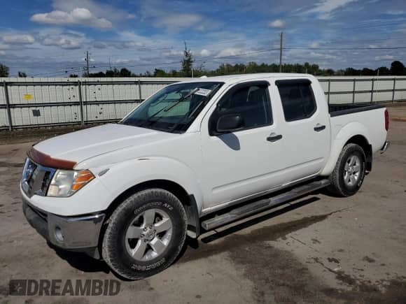 2011 Nissan Frontier SV with VIN 1N6AD0ER3BC404506, listed as a Copart auction lot 85183355 with 135,263 mi miles and Salvage title. Bid and sale history available at DreamBid. Image 1.