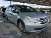 2013 Honda Odyssey LX z VIN 5FNRL5H27DB052198, wystawiony jako Copart lot #85646085 z przebiegiem 130 530 mil mil oraz Szkoda całkowita • Salvage title. Historia ofert i sprzedaży dostępna na DreamBid. Obrazek 4.
