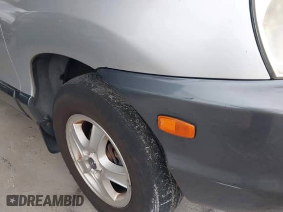 2001 Hyundai Santa Fe GLS с VIN KM8SC83D51U055658, выставлен на аукционе IAAI как лот 43168695 с пробегом 140 263 миль миль и . История ставок и продаж доступна на DreamBid. Изображение 14.