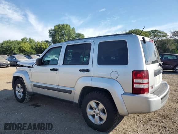 2011 Jeep Liberty Sport with VIN 1J4PN2GK1BW520494, listed as a Copart auction lot 69432985 with 97,037 mi miles and Salvage title. Bid and sale history available at DreamBid. Image 2.