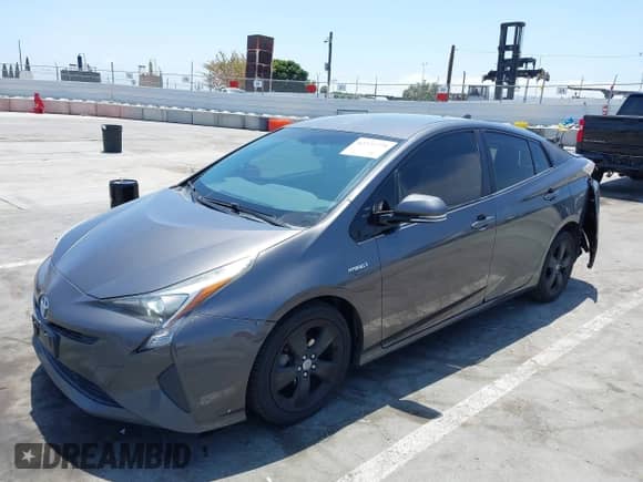 2016 Toyota Prius Four z VIN JTDKARFUXG3520915, wystawiony jako IAAI lot #42272779 z przebiegiem 152 671 mil mil oraz . Historia ofert i sprzedaży dostępna na DreamBid. Obrazek 2.