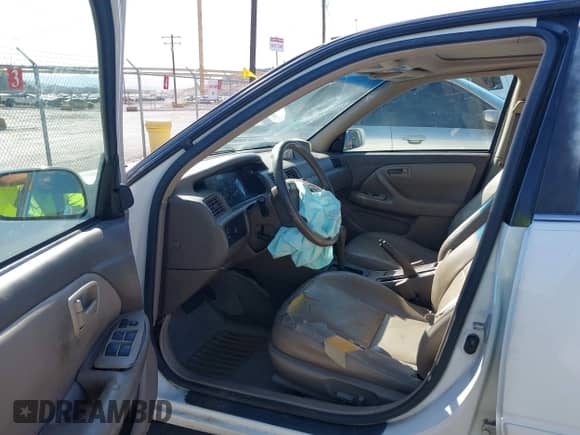 1997 Toyota Camry LE z VIN 4T1BF22K8VU903719, wystawiony jako IAAI lot #43385700 z przebiegiem 260 820 mil mil oraz . Historia ofert i sprzedaży dostępna na DreamBid. Obrazek 5.