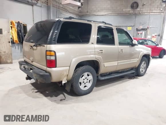 2006 Chevrolet Tahoe LS z VIN 1GNEK13TX6J114951, wystawiony jako IAAI lot #42873631 z przebiegiem 202 663 mil mil oraz . Historia ofert i sprzedaży dostępna na DreamBid. Obrazek 4.