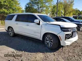 2025 Chevrolet Suburban High Country with VIN 1GNS6GRL9SR137022, listed as a Copart auction lot 84966035 with 19,914 mi miles and Salvage title. Bid and sale history available at DreamBid. Image 4.
