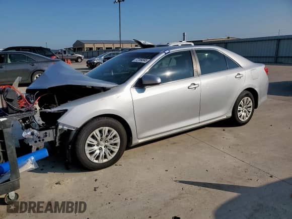 2014 Toyota Camry L с VIN 4T4BF1FK6ER350885, выставлен на аукционе Copart как лот 72104345 с пробегом 168 250 миль миль и Списание • Salvage title. История ставок и продаж доступна на DreamBid. Изображение 1.