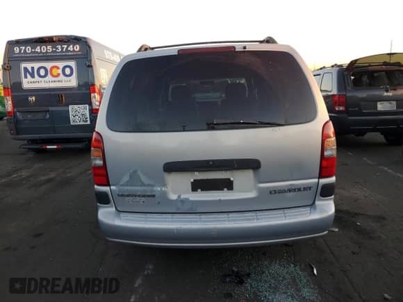 2001 Chevrolet Venture Plus Y3H Mobility with VIN 1GNDX03E21D321768, listed as a Copart auction lot 74368984 with 202,913 mi miles and Salvage title. Bid and sale history available at DreamBid. Image 6.