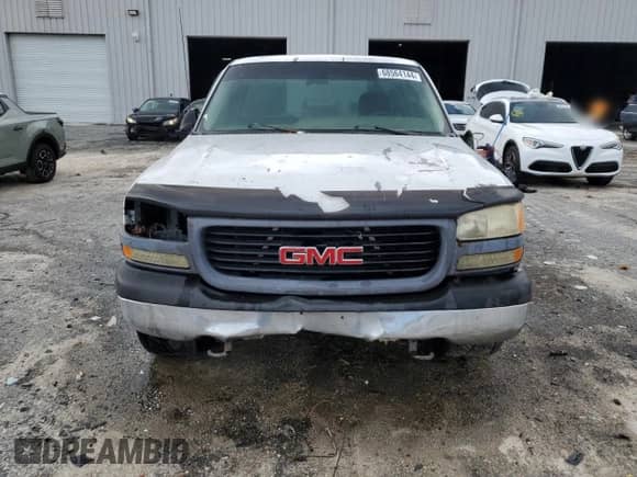 2002 GMC Sierra 1500 z VIN 1GTEC14W12Z170108, wystawiony jako Copart lot #68564144 z przebiegiem Nie podano mil oraz Szkoda całkowita • Salvage title. Historia ofert i sprzedaży dostępna na DreamBid. Obrazek 5.