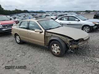 2001 Saturn LS with VIN 1G8JW52R51Y523667, listed as a Copart auction lot 72062224 with 123,345 mi miles and Salvage title. Bid and sale history available at DreamBid. Image 4.