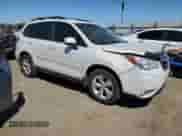 2014 Subaru Forester Premium with VIN JF2SJACC7EG459947, listed as a Copart auction lot 64106135 with 151,033 mi miles and Salvage title. Bid and sale history available at DreamBid. Image 4.