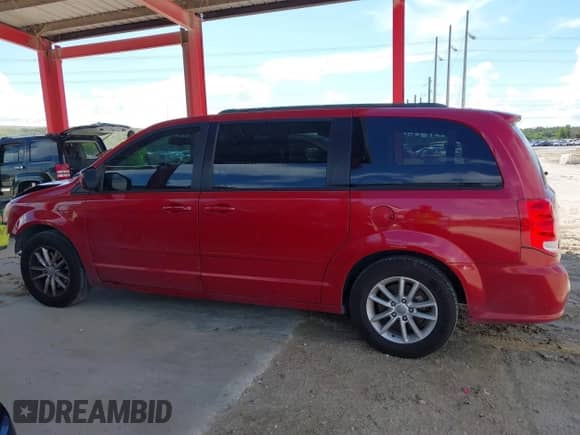 2014 Dodge Grand Caravan SXT with VIN 2C4RDGCG4ER129711, listed as a IAAI auction lot 43317873 with 164,242 mi miles and . Bid and sale history available at DreamBid. Image 14.