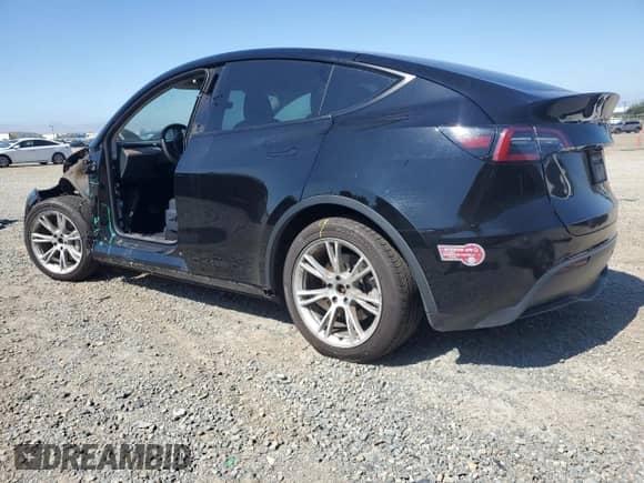 2023 Tesla Model Y Long Range with VIN 7SAYGDEE9PF928625, listed as a Copart auction lot 81783545 with 153,272 mi miles and Salvage title. Bid and sale history available at DreamBid. Image 2.