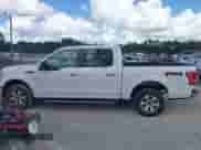 2015 Ford F-150 XLT with VIN 1FTEW1EF0FKE47898, listed as a IAAI auction lot 43274708 with 245,135 mi miles and . Bid and sale history available at DreamBid. Image 14.
