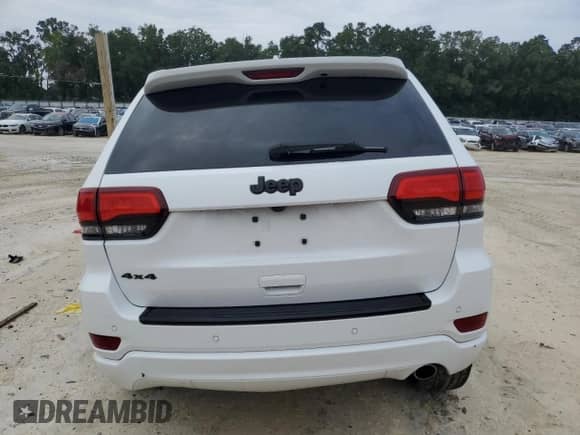 2017 Jeep Grand Cherokee Altitude with VIN 1C4RJFAG6HC701980, listed as a Copart auction lot 65880905 with 96,428 mi miles and Salvage title. Bid and sale history available at DreamBid. Image 6.