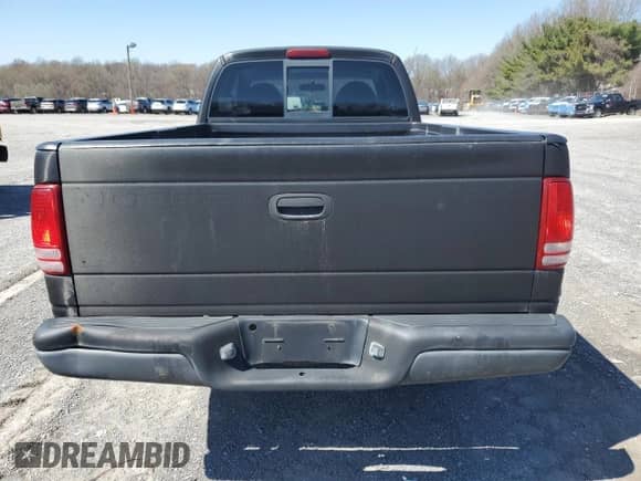 1997 Dodge Dakota z VIN 1B7GG23X3VS217651, wystawiony jako Copart lot #48300715 z przebiegiem 177 554 mil mil oraz Szkoda całkowita • Salvage title. Historia ofert i sprzedaży dostępna na DreamBid. Obrazek 6.