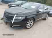 2014 Chevrolet Impala LTZ with VIN 2G1145SL7E9157706, listed as a IAAI auction lot 43556639 with 132,482 mi miles and . Bid and sale history available at DreamBid. Image 2.