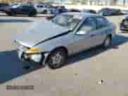 2000 Saturn LS z VIN 1G8JS52F0YY687243, wystawiony jako Copart lot #77773504 z przebiegiem 139 323 mil mil oraz Szkoda całkowita • Salvage title. Historia ofert i sprzedaży dostępna na DreamBid. Obrazek 1.