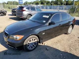 2007 BMW 3 Series 328xi with VIN WBAVC93557KX57156, listed as a Copart auction lot 70149265 with 155,183 mi miles and Salvage title. Bid and sale history available at DreamBid. Image 1.