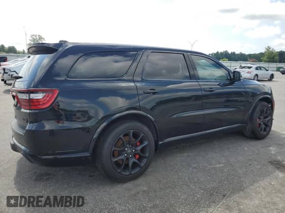 2023 Dodge Durango SRT Hellcat with VIN 1C4SDJH96PC694997, listed as a Copart auction lot 64183375 with 8,290 mi miles and Salvage title. Bid and sale history available at DreamBid. Image 3.