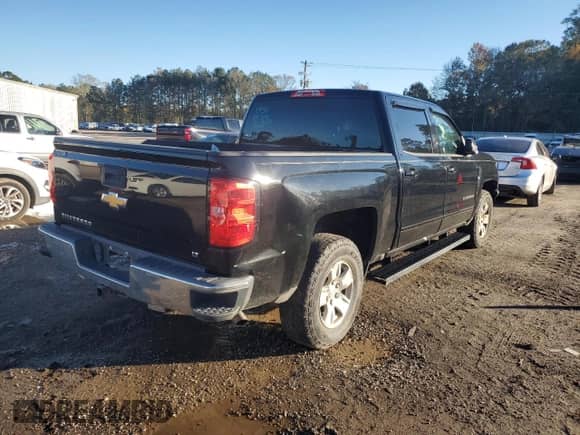 2017 Chevrolet Silverado 1500 LT with VIN 3GCPCREH1HG282357, listed as a Copart auction lot 83565994 with 175,108 mi miles and Salvage title. Bid and sale history available at DreamBid. Image 3.