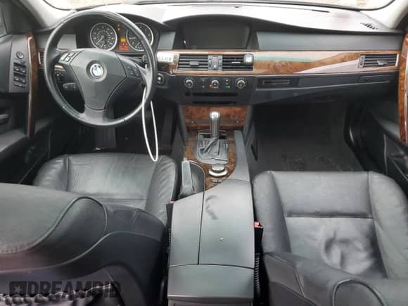 2007 BMW 5 Series 525i with VIN WBANE53577CW66306, listed as a Copart auction lot 87458205 with 175,473 mi miles and Salvage title. Bid and sale history available at DreamBid. Image 8.