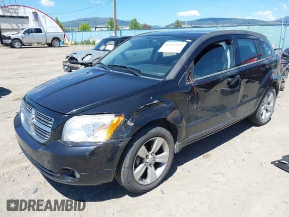 2011 Dodge Caliber Mainstreet with VIN 1B3CB3HAXBD156405, listed as a IAAI auction lot 42327317 with 93,355 mi miles and . Bid and sale history available at DreamBid. Image 2.