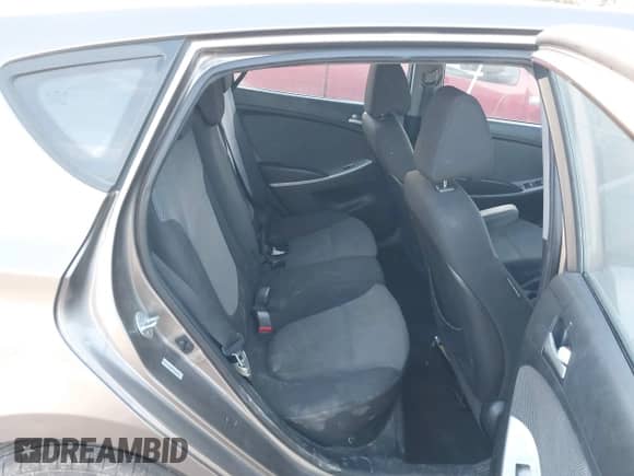 2014 Hyundai Accent GS z VIN KMHCT5AE6EU165851, wystawiony jako IAAI lot #41313636 z przebiegiem 161 054 mil mil oraz . Historia ofert i sprzedaży dostępna na DreamBid. Obrazek 8.