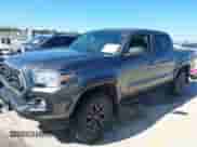 2021 Toyota Tacoma SR5 with VIN 5TFAZ5CN0MX106119, listed as a IAAI auction lot 42812735 with 70,968 mi miles and . Bid and sale history available at DreamBid. Image 2.