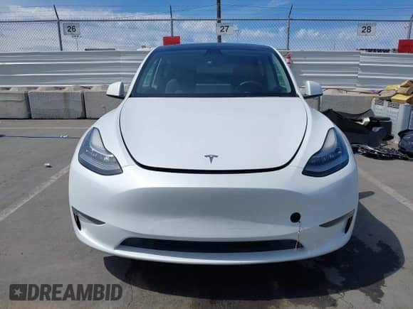 2022 Tesla Model Y Long Range z VIN 7SAYGDEE0NF451306, wystawiony jako IAAI lot #43253038 z przebiegiem 49 961 mil mil oraz . Historia ofert i sprzedaży dostępna na DreamBid. Obrazek 13.