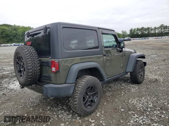 2016 Jeep Wrangler Willys Wheeler z VIN 1C4AJWAG8GL118032, wystawiony jako Copart lot #69217005 z przebiegiem 26 745 mil mil oraz Szkoda całkowita • Salvage title. Historia ofert i sprzedaży dostępna na DreamBid. Obrazek 3.