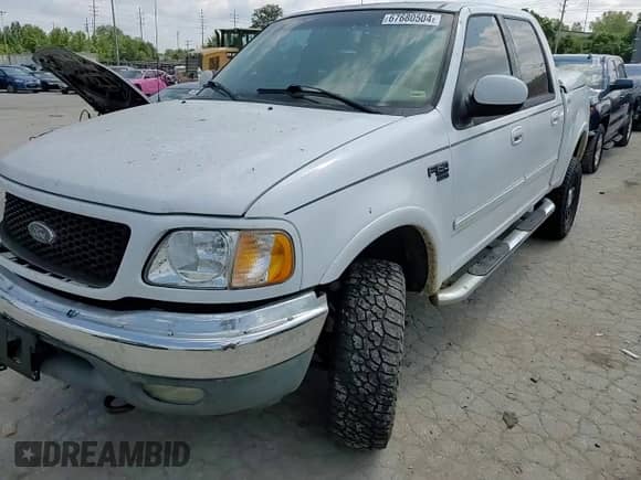 2002 Ford F-150 XLT с VIN 1FTRW08642KD07239, выставлен на аукционе Copart как лот 67680504 с пробегом Не указан миль и Списание • Salvage title. История ставок и продаж доступна на DreamBid. Изображение 11.