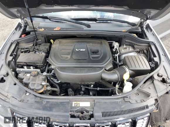 2017 Jeep Grand Cherokee Altitude with VIN 1C4RJFAG7HC720165, listed as a Copart auction lot 85197095 with 83,075 mi miles and Salvage title. Bid and sale history available at DreamBid. Image 12.