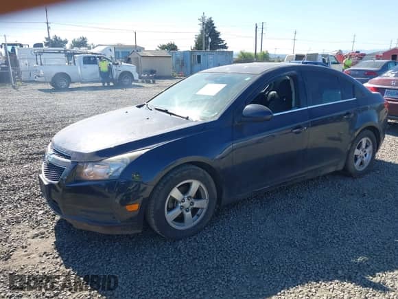 2014 Chevrolet Cruze 1LT with VIN 1G1PD5SB2E7358304, listed as a IAAI auction lot 42074155 with 174,823 mi miles and . Bid and sale history available at DreamBid. Image 2.