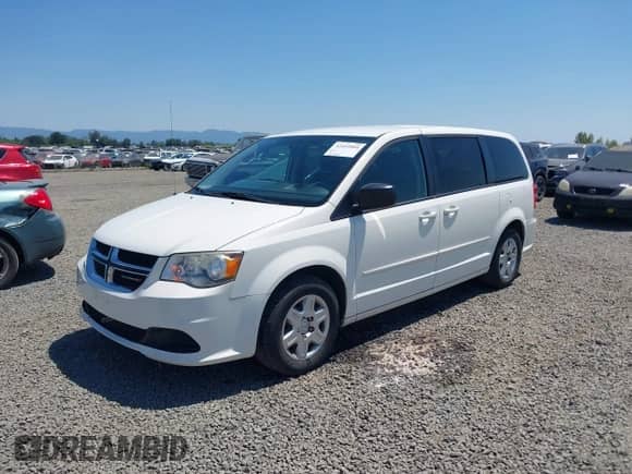 2012 Dodge Grand Caravan American Value z VIN 2C4RDGBG5CR420149, wystawiony jako IAAI lot #42454884 z przebiegiem 130 512 mil mil oraz . Historia ofert i sprzedaży dostępna na DreamBid. Obrazek 2.