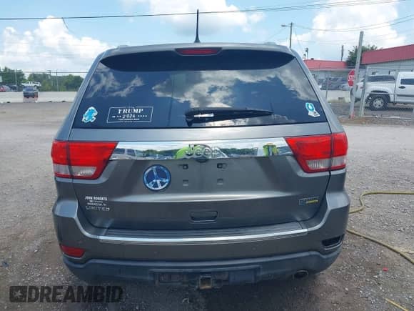 2012 Jeep Grand Cherokee Limited z VIN 1C4RJEBGXCC290696, wystawiony jako IAAI lot #42753634 z przebiegiem 205 808 mil mil oraz . Historia ofert i sprzedaży dostępna na DreamBid. Obrazek 16.