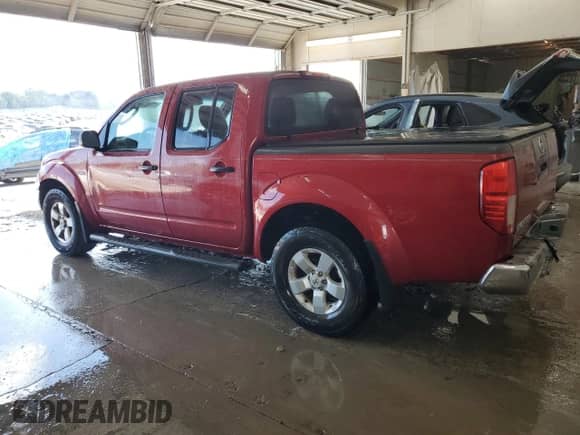 2010 Nissan Frontier SE with VIN 1N6AD0ER2AC432134, listed as a Copart auction lot 80090775 with 132,706 mi miles and Salvage title. Bid and sale history available at DreamBid. Image 2.