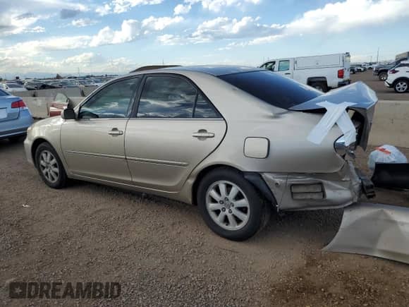 2003 Toyota Camry LE z VIN 4T1BF30K73U057881, wystawiony jako Copart lot #80207065 z przebiegiem 240 172 mil mil oraz Szkoda całkowita • Salvage title. Historia ofert i sprzedaży dostępna na DreamBid. Obrazek 2.